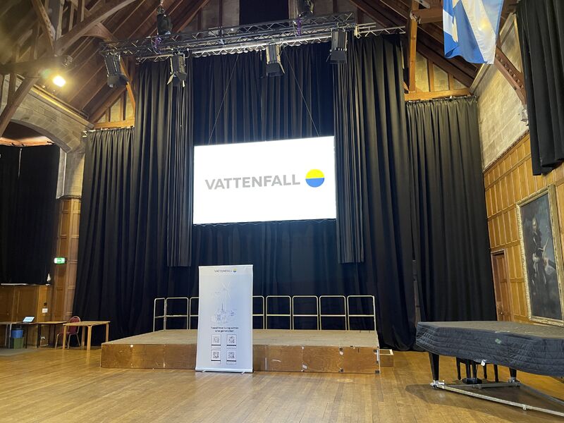 Hall prepared ready for attendees with large Vattenfall logo in the background